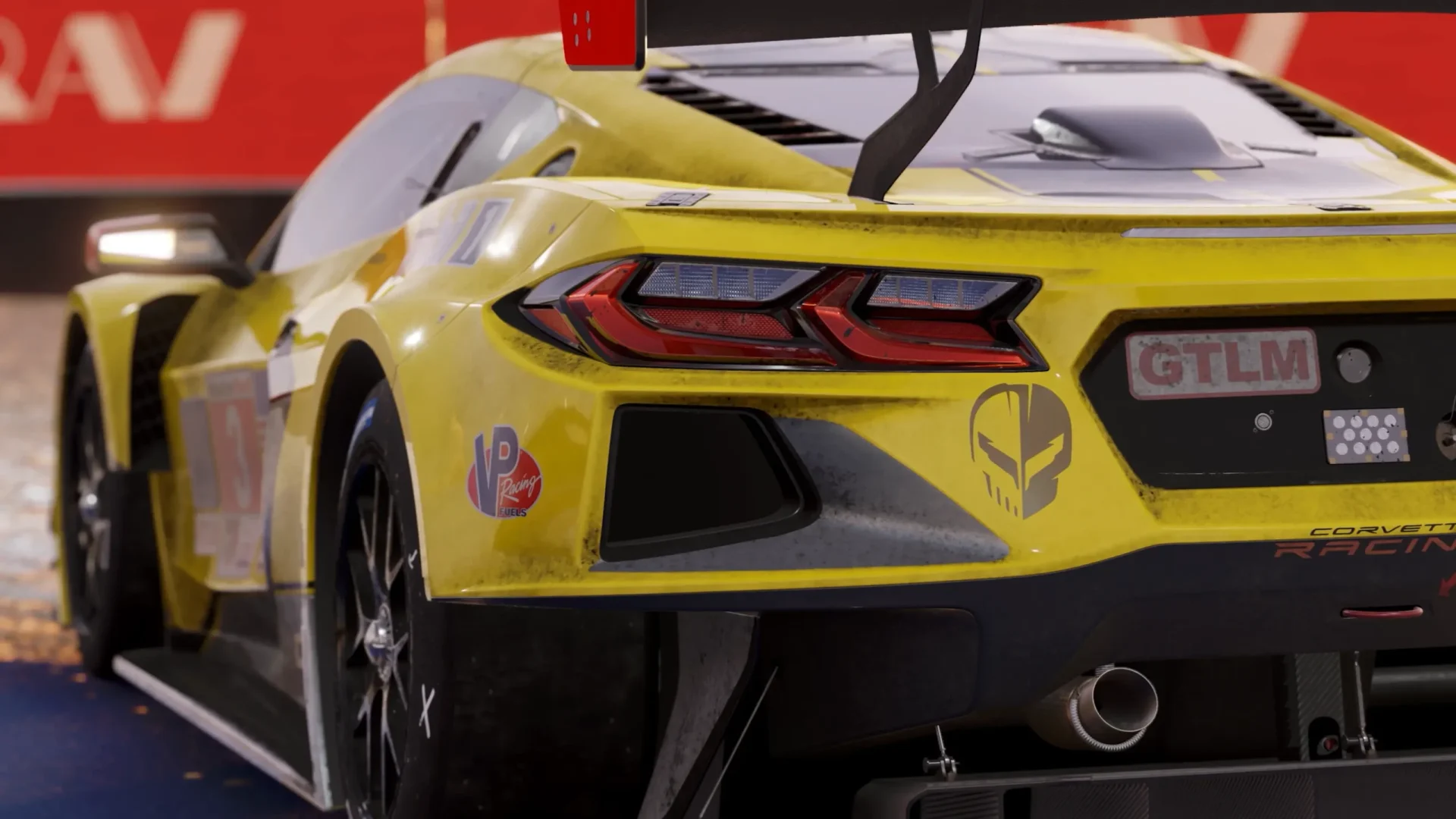 Close-up of a yellow Corvette race car from Forza Motorsport, showing the rear bodywork, taillights, racing decals, and, spoiler alert, a spoiler.